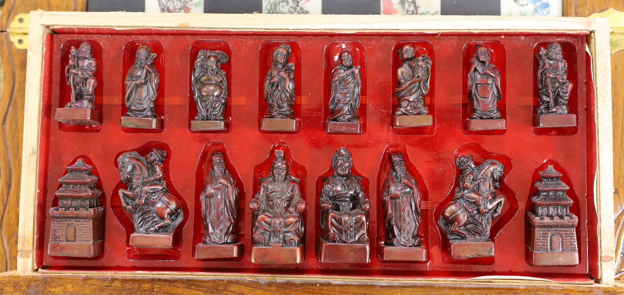 A Chinese chess set with resin pieces, 39x39cm